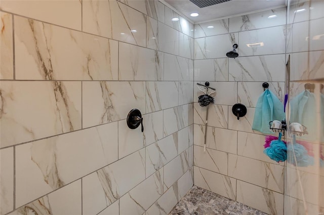 bathroom featuring tiled shower