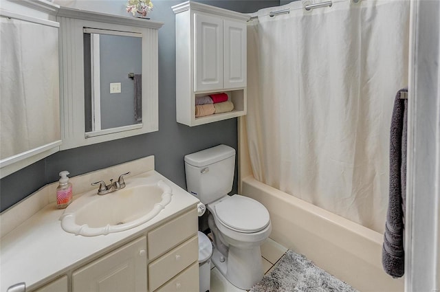 full bathroom with vanity, toilet, tile patterned floors, and shower / bath combination with curtain