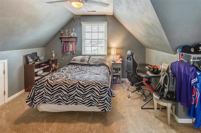 bedroom featuring carpet floors, a textured ceiling, vaulted ceiling, and ceiling fan