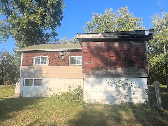 view of property exterior featuring a yard