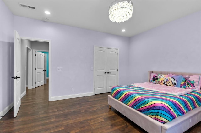 bedroom featuring dark wood-type flooring