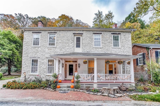 view of front facade featuring covered porch