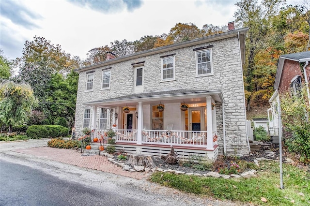 view of front of house with covered porch