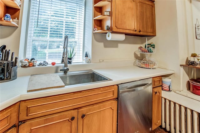 kitchen featuring sink, dishwasher, and a healthy amount of sunlight