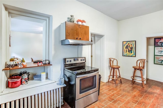 kitchen featuring stainless steel electric range