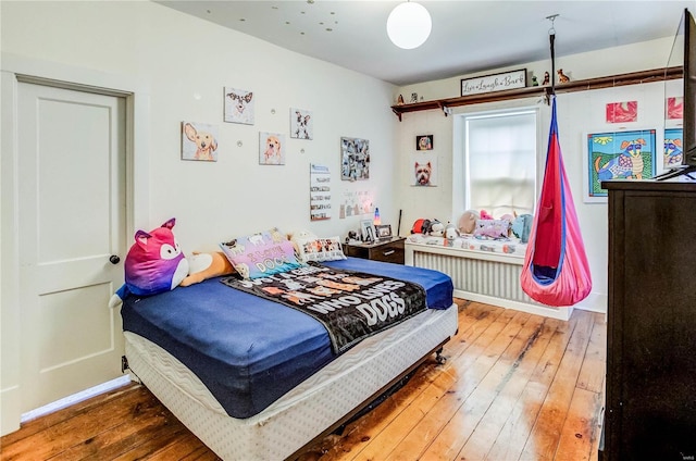 bedroom featuring wood-type flooring