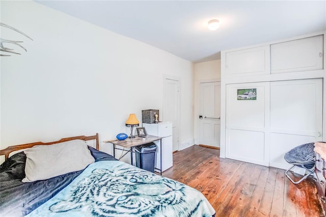 bedroom featuring hardwood / wood-style flooring