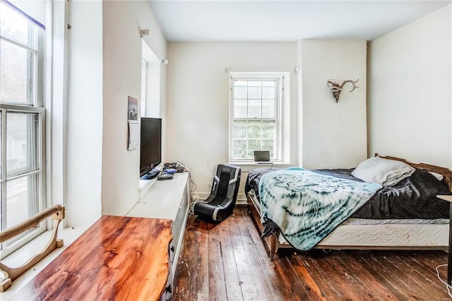 bedroom featuring dark wood-type flooring