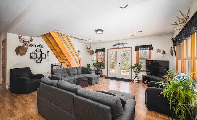 living room featuring french doors and wood-type flooring