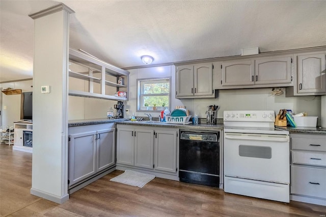 kitchen featuring electric range, dishwasher, dark hardwood / wood-style floors, and gray cabinets