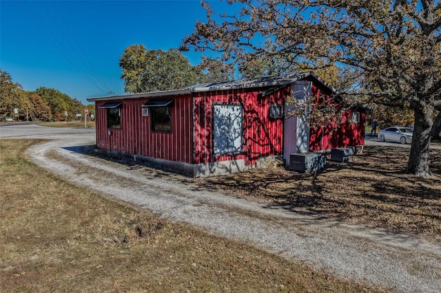 view of outbuilding featuring central AC