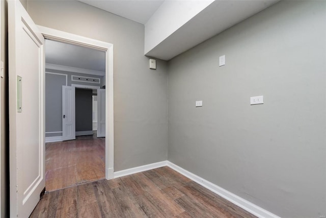 hall with dark wood-type flooring