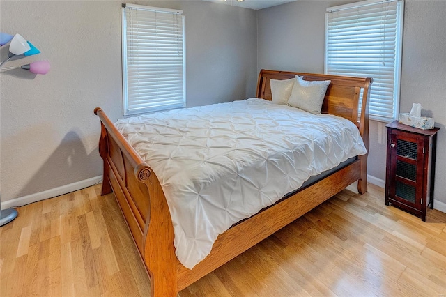 bedroom with light hardwood / wood-style floors