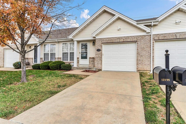 view of front facade with a garage and a front yard