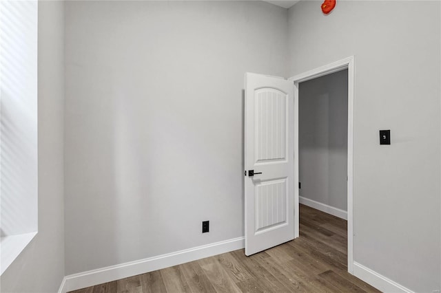 empty room featuring wood-type flooring