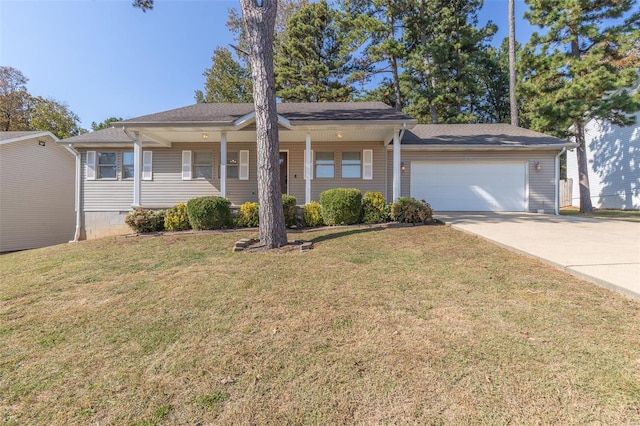 ranch-style house featuring a garage and a front lawn