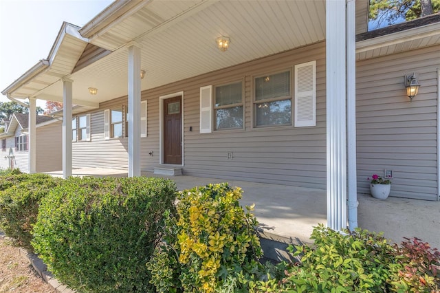 property entrance with a porch