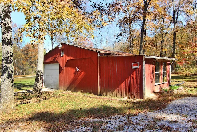 view of outbuilding with a garage