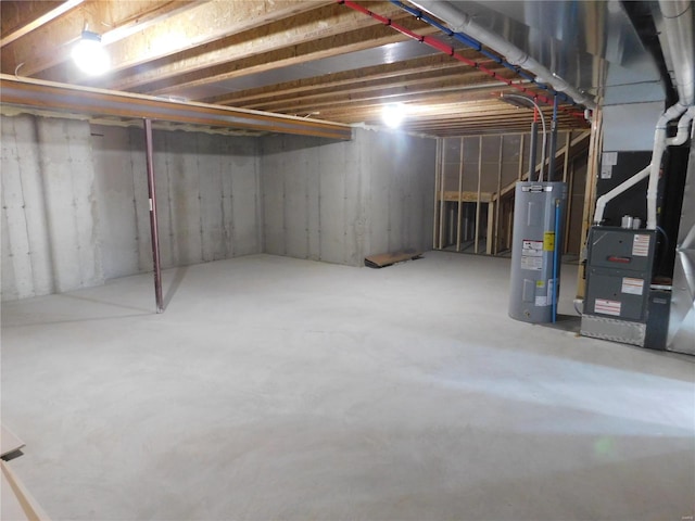 unfinished basement with heating unit and electric water heater