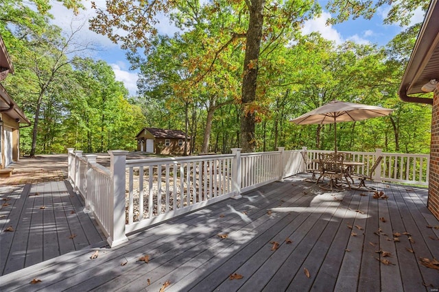 deck featuring an outdoor structure