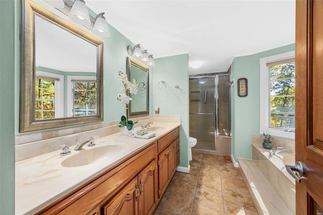 full bathroom with vanity, ornamental molding, plus walk in shower, tile patterned floors, and toilet