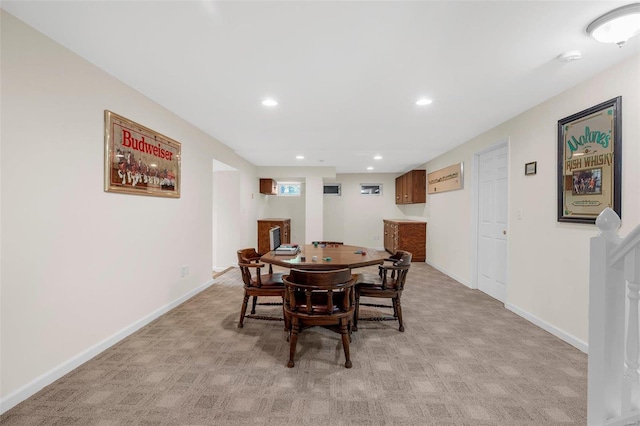 dining area with light carpet