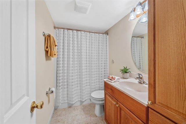 full bathroom featuring tile patterned flooring, vanity, toilet, and shower / bathtub combination with curtain