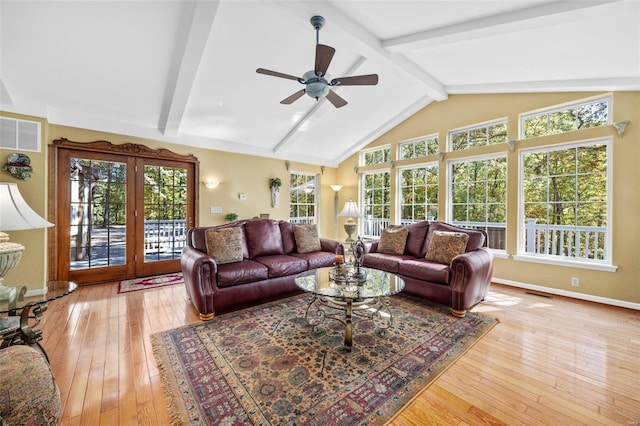 living room featuring vaulted ceiling with beams, ceiling fan, and light hardwood / wood-style flooring