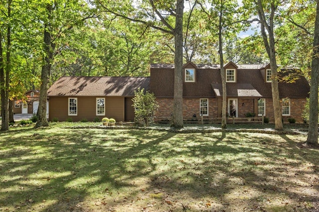 view of front of home with a front yard