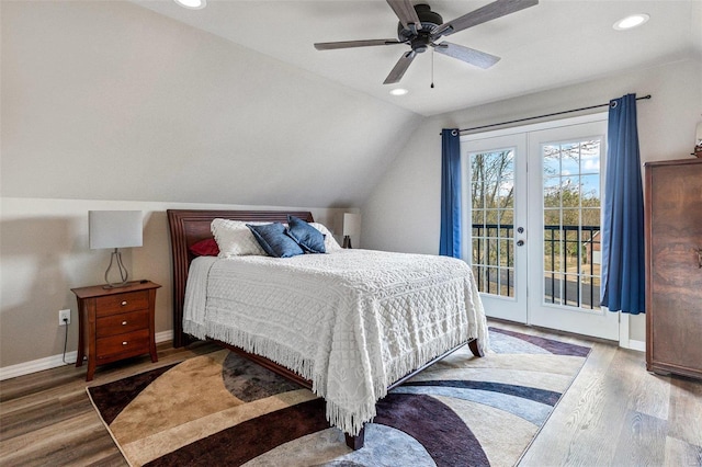 bedroom with french doors, access to exterior, hardwood / wood-style floors, ceiling fan, and vaulted ceiling