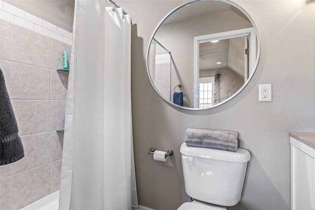 bathroom with vanity, toilet, and a shower with shower curtain