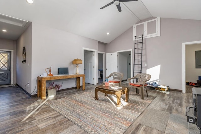 living room featuring electric panel, ceiling fan, dark hardwood / wood-style flooring, and high vaulted ceiling