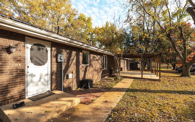 property entrance with a patio area