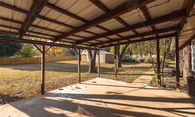 view of patio / terrace featuring a shed