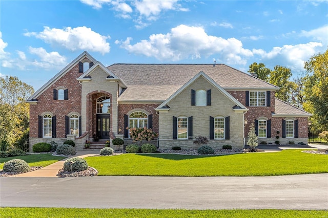 view of front facade with a front yard