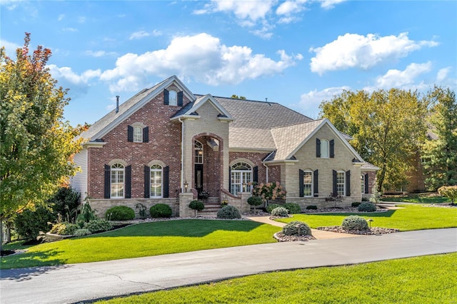 view of front of home with a front yard