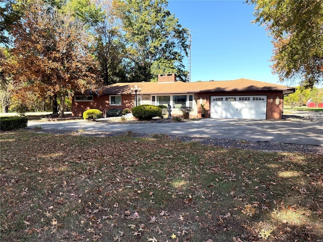 ranch-style home featuring a garage