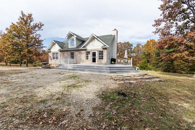 view of front of house with a wooden deck