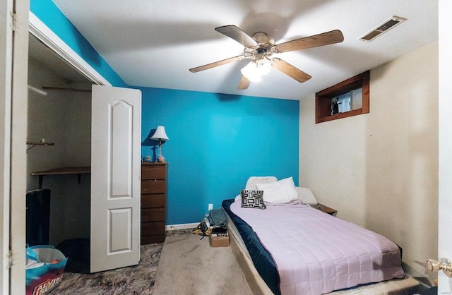 carpeted bedroom featuring ceiling fan