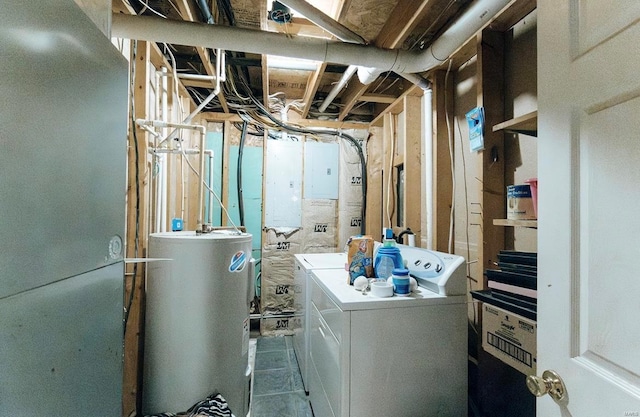 laundry area featuring washing machine and clothes dryer and gas water heater