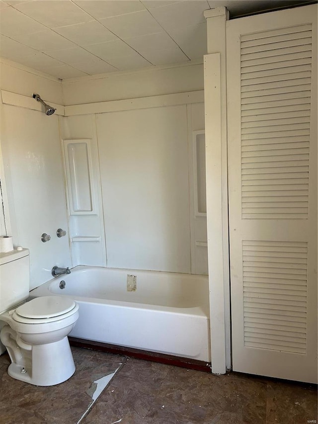 bathroom with toilet and tub / shower combination