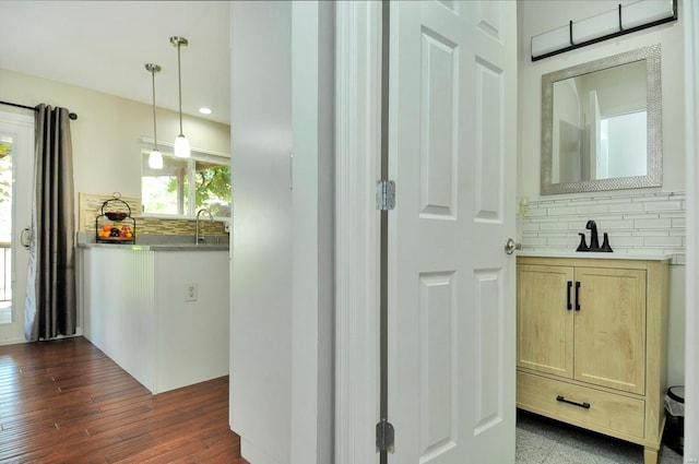 hallway featuring dark hardwood / wood-style flooring