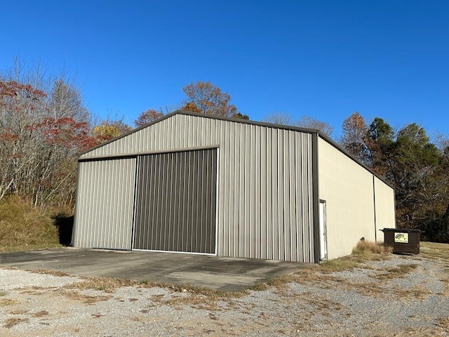 view of outbuilding featuring a garage