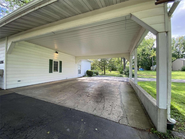 view of patio / terrace with a carport