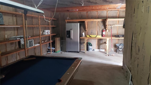 basement with billiards and stainless steel fridge with ice dispenser