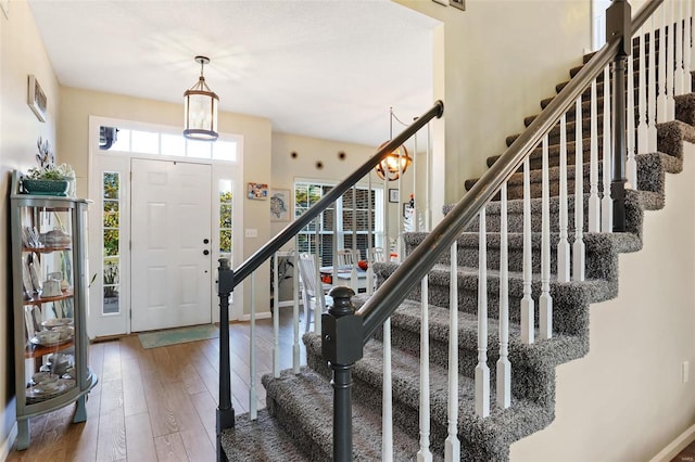 foyer with hardwood / wood-style flooring