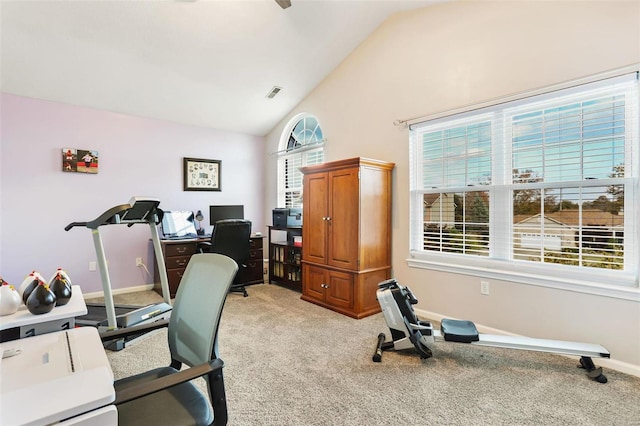 carpeted office space with lofted ceiling