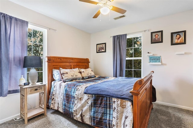 carpeted bedroom with ceiling fan