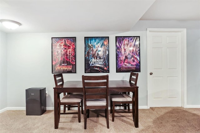 dining space featuring carpet floors