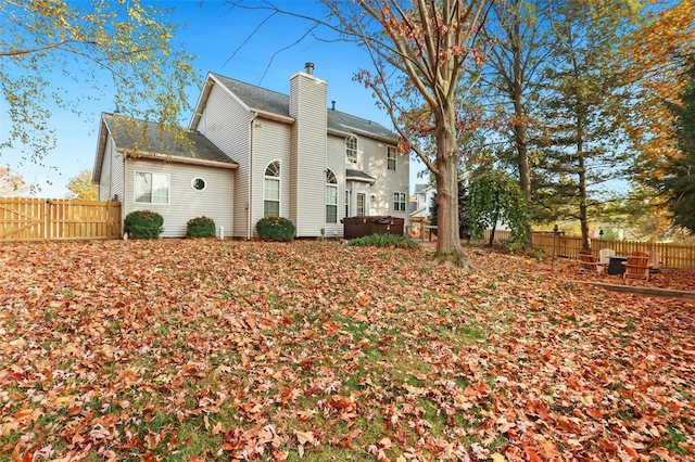 view of property exterior featuring a deck